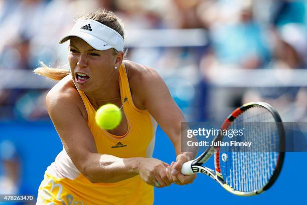 Caroline Wozniacki of Denmark in action against Svetlana Kuznetsova of Russia during the Aegon International day four at Devonshire Park on June 24,...