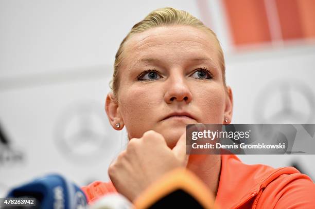 Alexandra Popp of Germany reacts during a press conference at Montreal Convention Centre on June 24, 2015 in Montreal, Canada.