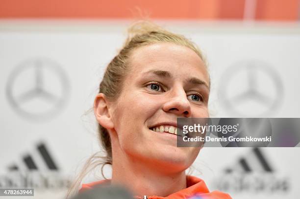 Simone Laudehr of Germany reacts during a press conference at Montreal Convention Centre on June 24, 2015 in Montreal, Canada.