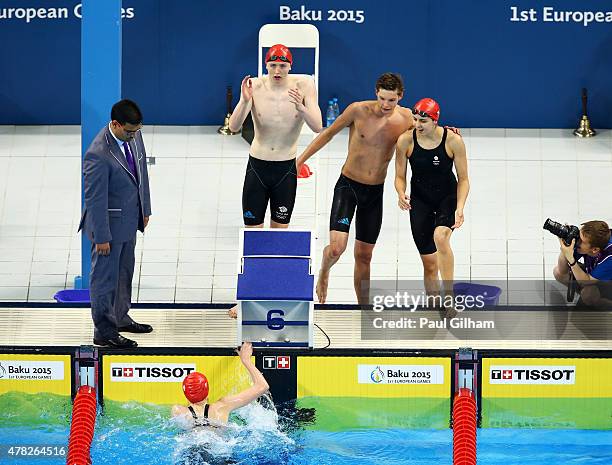 Georgia Coates, Darcy Deakin, Martyn Walton and Duncan Scott of Great Britain celebrate winning silver in the Mixed 4x100m Freestyle Relay final...