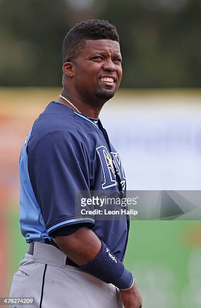 Wilson Betemit of the Tampa Bay Rays looks into the dugout during the game against the Toronto Blue Jays at Florida Auto Exchange Stadium on March...