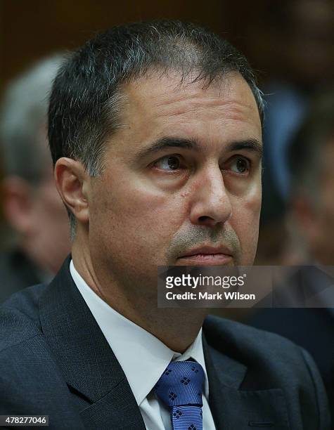 Eric Hess, CEO of KeyPoint Government Solutions, appears before a House Oversight and Government Reform Committee on Capitol Hill June 24, 2015 in...