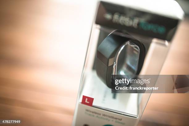 new fitbit force, sport fitness tracker - fitbit stock pictures, royalty-free photos & images