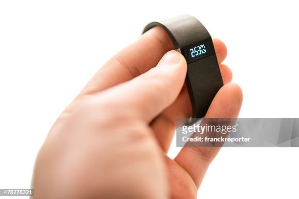 new fitbit force, sport fitness tracker - fitbit stock pictures, royalty-free photos & images