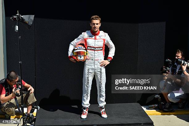 Marussia driver Jules Bianchi of France poses during a photo shoot ahead of the Formula One Australian Grand Prix in Melbourne on March 13, 2014. AFP...