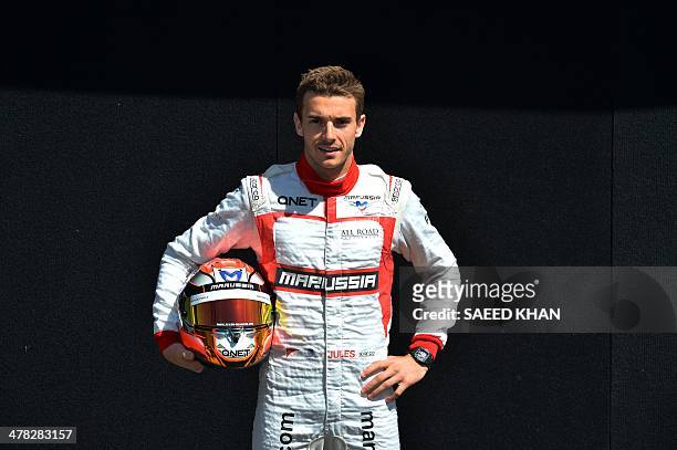 Marussia driver Jules Bianchi of France poses during a photo shoot ahead of the Formula One Australian Grand Prix in Melbourne on March 13, 2014. AFP...