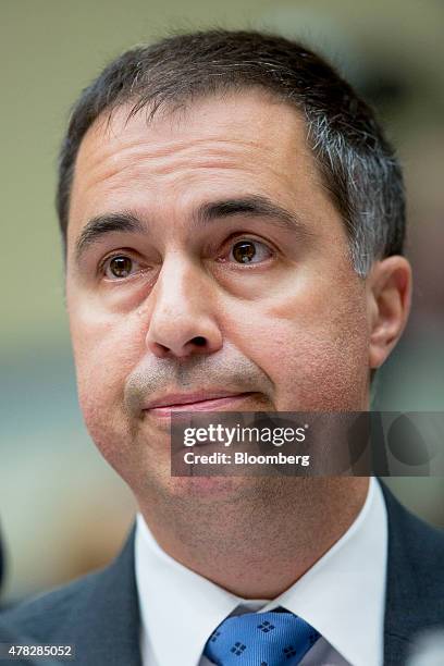 Eric Hess, chief executive officer of KeyPoint Government Solutions, pauses after speaking during a House Oversight and Government Reform Committee...