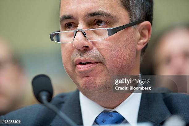 Eric Hess, chief executive officer of KeyPoint Government Solutions, speaks during a House Oversight and Government Reform Committee hearing on the...