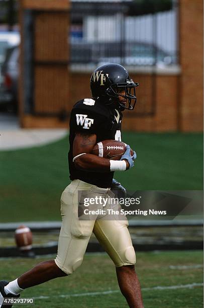 Eric King of the Wake Forest Demon Deacons runs with the ball against the North Carolina Tar Heels on October 26, 2002.