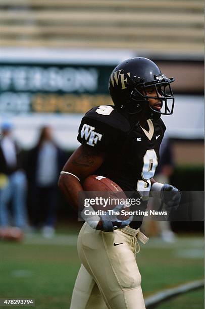 Eric King of the Wake Forest Demon Deacons runs with the ball against the North Carolina Tar Heels on October 26, 2002.