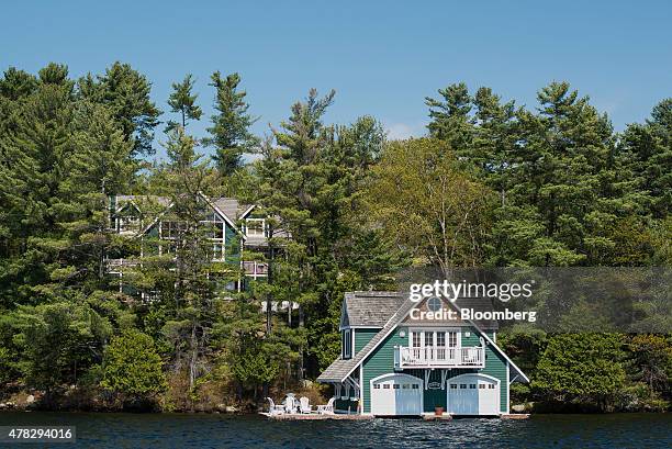 Large cottage stands on Lake Rosseau in Muskoka, Ontario, Canada, on Saturday, May 23, 2015. The Canadian sanctuary of Muskoka, once given away for...