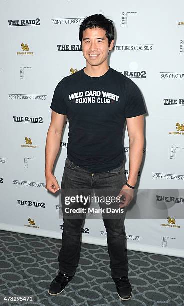 Mixed martial artists Cung Le attends the premiere of Sony Picture Classics' "The Raid 2" held at the Harmony Gold Theatre on March 12, 2014 in Los...