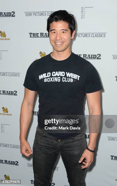 Mixed martial artists Cung Le attends the premiere of Sony Picture Classics' "The Raid 2" held at the Harmony Gold Theatre on March 12, 2014 in Los...