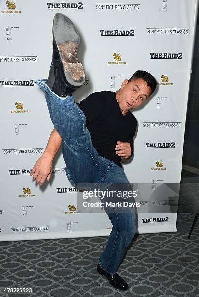 Mixed martial artists Cung Le attends the premiere of Sony Picture Classics' "The Raid 2" held at the Harmony Gold Theatre on March 12, 2014 in Los...