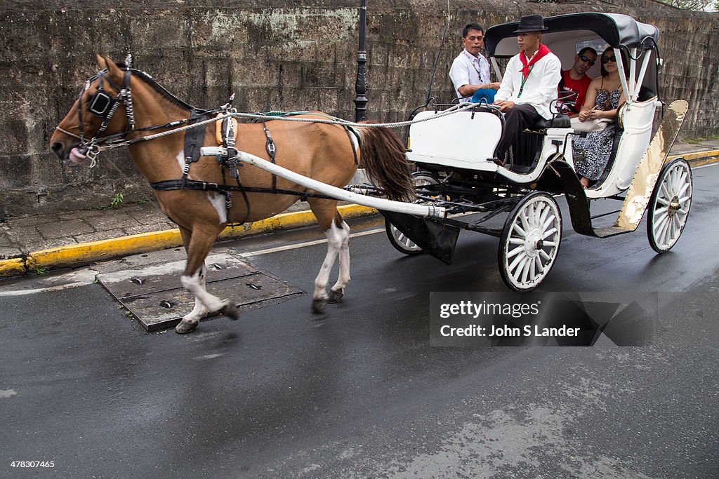 Calesa (sometimes spelled kalesa) is a horse drawn carraige...