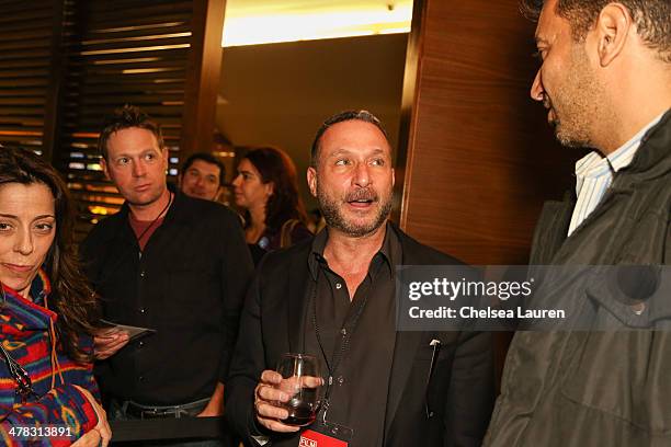 Moderator Alan Poul speaks with guests at the Film Independent directors close-up at Landmark Nuart Theatre on March 12, 2014 in Los Angeles,...