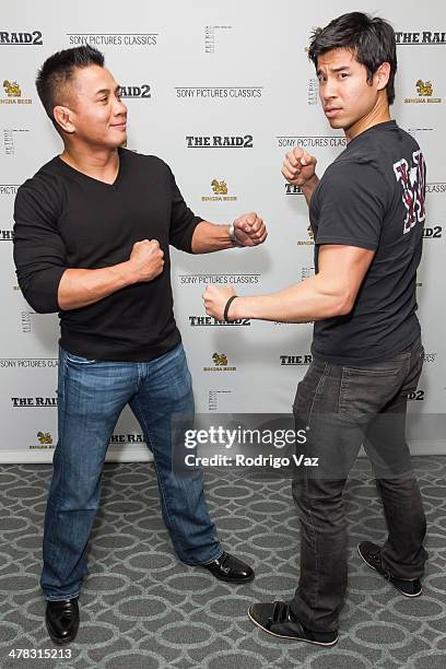 Actors and mixed martial artists Cung Le and Jon Lee Brody attend "The Raid 2" - Los Angeles Premiere arrivals at Harmony Gold Theatre on March 12,...