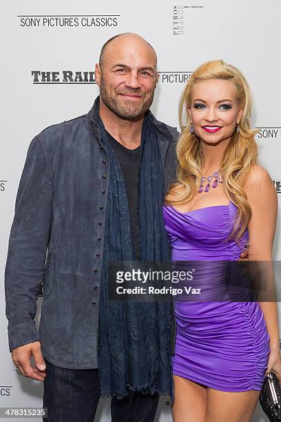 Actors Randy Couture and Mindy Robinson attend "The Raid 2" - Los Angeles Premiere arrivals at Harmony Gold Theatre on March 12, 2014 in Los Angeles,...
