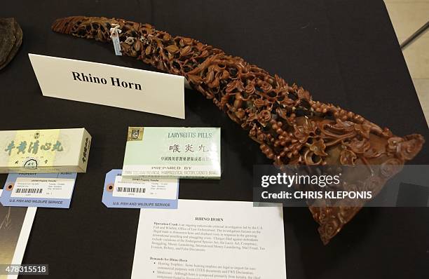 Carved rhino horn is among the confiscated wildlife contraband placed on display during the seventh U.S.-China Strategic and Economic Dialogue at the...