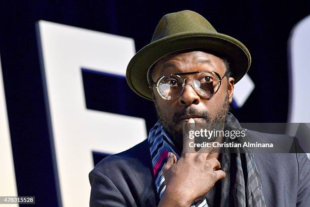 Singer Will.i.am speaks on stage during the SalesForce forum as part of the Cannes Lions International Festival of Creativity on June 24, 2015 in...