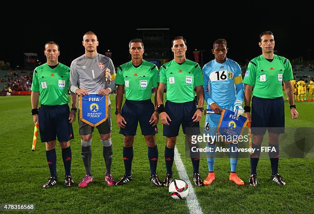 Predrag Rajkovic the captain of Serbia and Djigui Diarra the captain of Mali line up with match officials prior to the FIFA U-20 World Cup Semi Final...