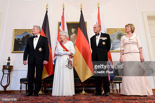 Queen Elizabeth II, Prince Philip, Duke of Edinburgh, German President Joachim Gauck and Daniela Schadt attend a State Banquet on day 2 of a four day...
