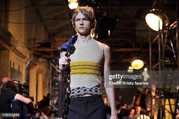 Model walks the runway during the Raf Simons Menswear Spring/Summer 2016 show as part of Paris Fashion Week on June 24, 2015 in Paris, France.