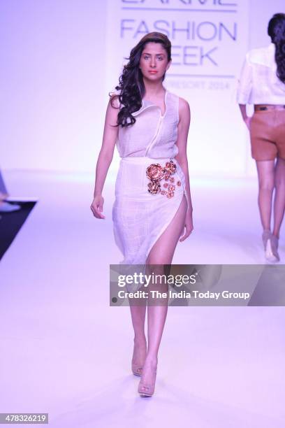 Model walks the ramp for designer Nikhil Thampi during the Lakme Fashion Week 2014 in Mumbai.