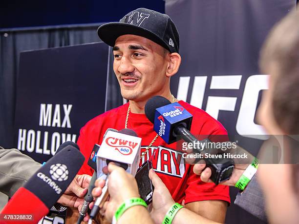 Max Holloway speaks to reporters at a press conference at the SaskTel Centre, June 24, 2015 in Saskatoon, Saskatchewan, Canada.