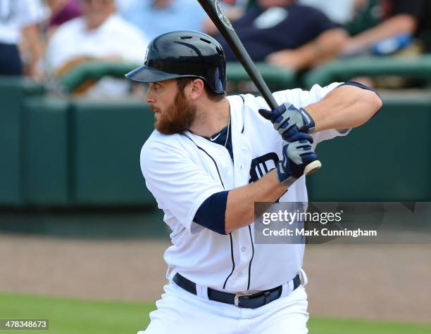 Trevor Crowe of the Detroit Tigers bats during the spring training game against the Toronto Blue Jays at Joker Marchant Stadium on March 11, 2014 in...