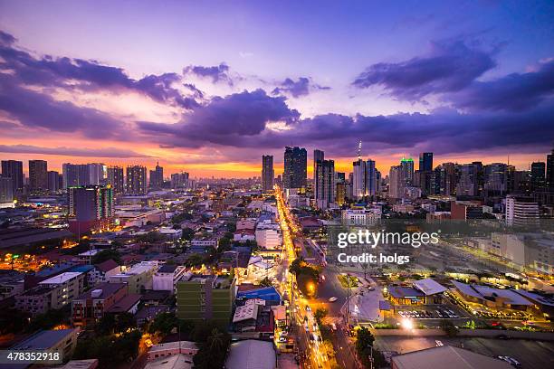 manila city at twilight muestra y ortigas ciudad de makati - manila fotografías e imágenes de stock