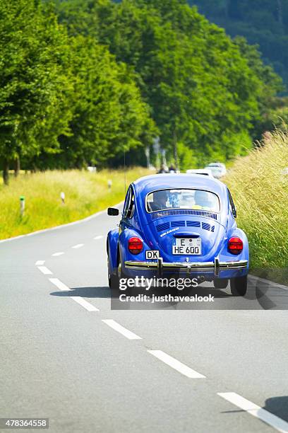 blue vw beetle oldtimer - beetle car stock pictures, royalty-free photos & images