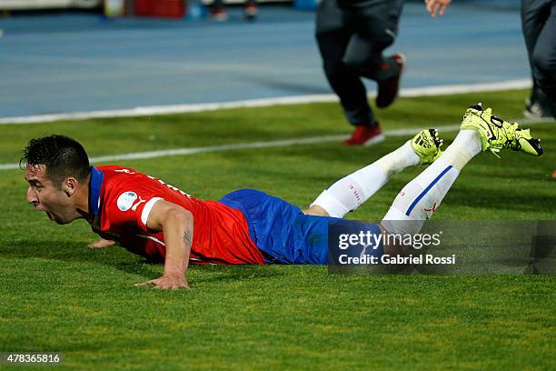 Mauricio Isla of Chile celebrates after scoring the opening goal during the 2015 Copa America Chile quarter final match between Chile and Uruguay at...