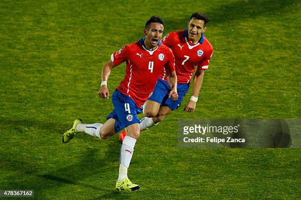 Mauricio Isla of Chile celebrates after scoring the opening goal during the 2015 Copa America Chile quarter final match between Chile and Uruguay at...
