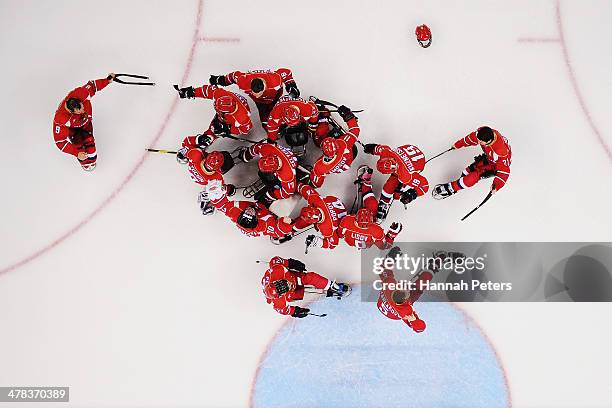 Russia celebrate winning the Ice Sledge Hockey semifinal match between Russia and Norway at the Shayba Arena during day six of the 2014 Paralympic...