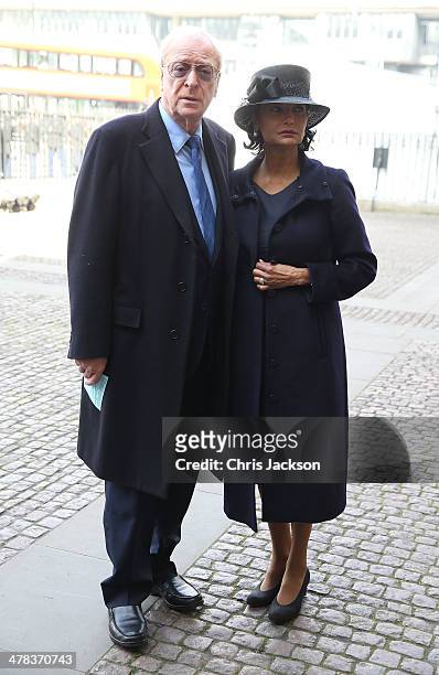 Sir Michael Caine and wife Shakira Caine attend a memorial service for Sir David Frost at Westminster Abbey on March 13, 2014 in London, England.