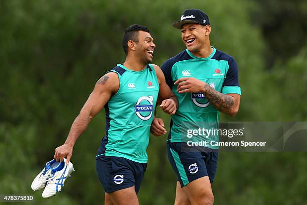 Kurtley Beale and Israel Folau of the Waratahs arrive at a Waratahs Super Rugby training session at Moore Park on June 25, 2015 in Sydney, Australia.