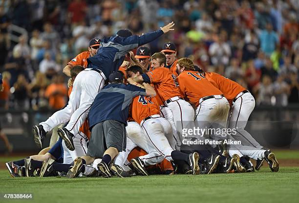 Players of the Virginia Cavaliers celebrate after beating the Vanderbilt Commodores 4-2 to win the National Championship, during game three of the...