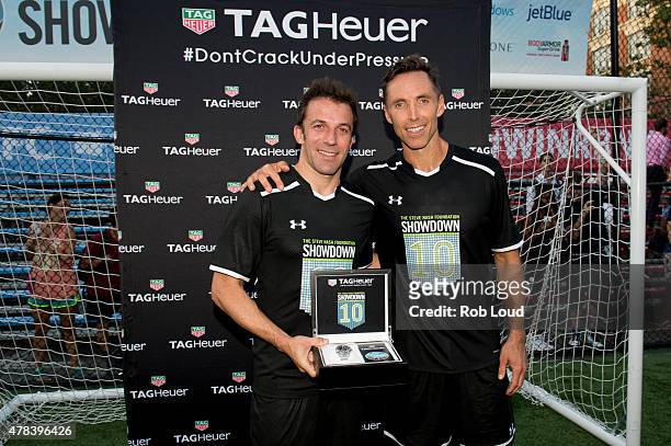 Italian soccer player Alessandro Del Piero and former NBA player Steve Nash pose with a Tag Heuer watch at Sara D. Roosevelt Park on June 24, 2015 in...