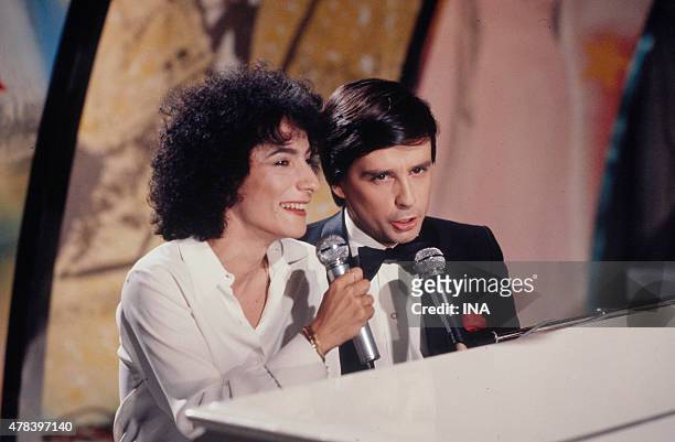 Marie Paule Belle and Thierry Le Luron in duet on the set of ""Number one""