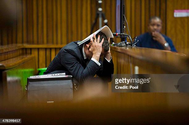 Oscar Pistorius at the Pretoria High Court on March 13 in Pretoria, South Africa. Pistorius, stands accused of the murder of his girlfriend, Reeva...