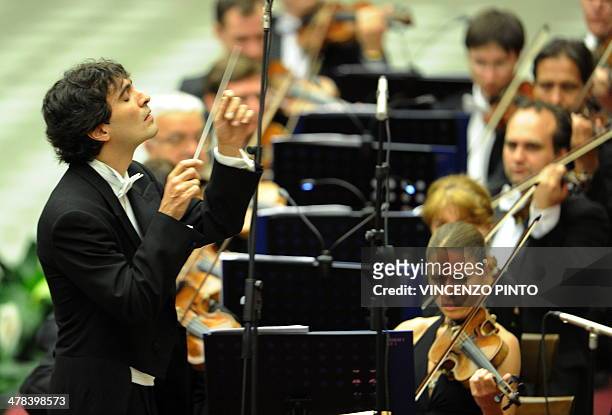 Italian conductor Carlo Ponti, son of Italian actress Sophia Loren and film producer Carlo Ponti, performs in front of Pope Benedict XVI during a...