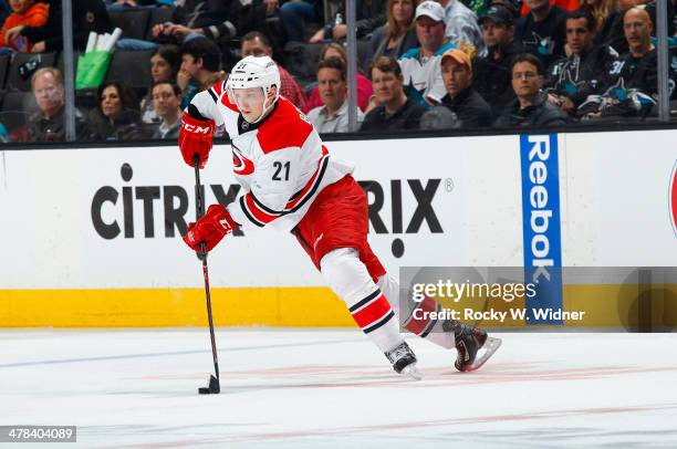 Drayson Bowman of the Carolina Hurricanes skates with control of the puck against the San Jose Sharks at SAP Center on March 4, 2014 in San Jose,...