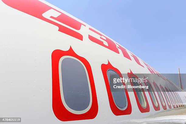 Boeing Co. 787 Dreamliner aircraft operated by Air India Ltd. Sits on display during the India Aviation 2014 air show held at the Begumpet Airport in...