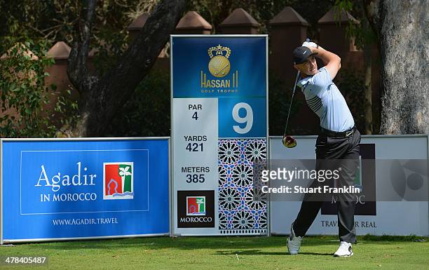 Tommy Fleetwood of England plays a shot during the first round of the Trophee du Hassan II Golf at Golf du Palais Royal on March 13, 2014 in Agadir,...