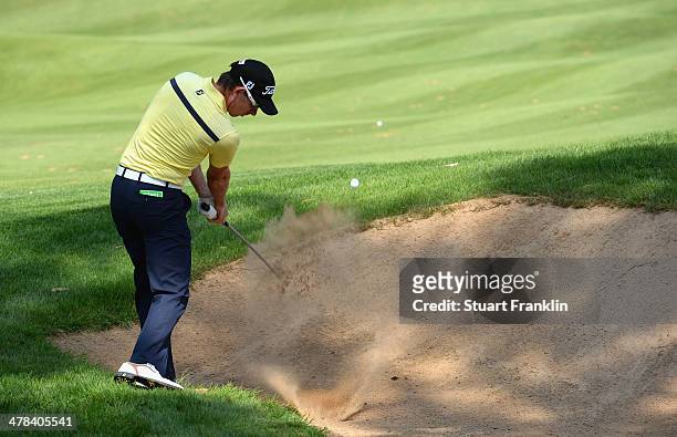 Brett Rumford of Australia plays a shot during the first round of the Trophee du Hassan II Golf at Golf du Palais Royal on March 13, 2014 in Agadir,...