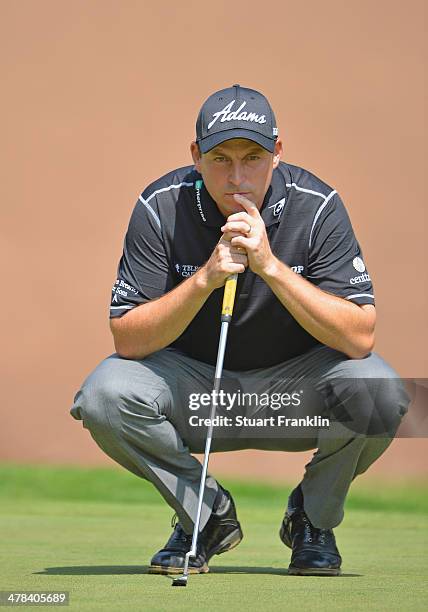 David Howell of England ponders a shot during the first round of the Trophee du Hassan II Golf at Golf du Palais Royal on March 13, 2014 in Agadir,...