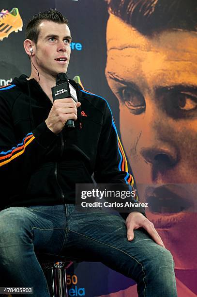 Real Madrid football player Gareth Bale presents the new "adizero f50" Adidas boots at Estadio Santiago Bernabeu on March 13, 2014 in Madrid, Spain.