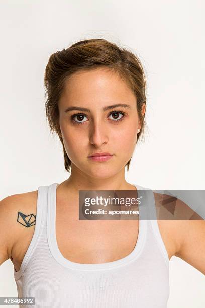 gender fluidity young woman with attitude and short hair - non binary stereotypes stock pictures, royalty-free photos & images
