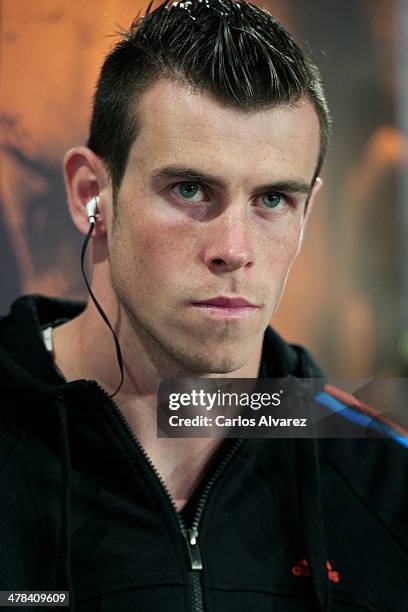 Real Madrid football player Gareth Bale presents the new "adizero f50" Adidas boots at Estadio Santiago Bernabeu on March 13, 2014 in Madrid, Spain.